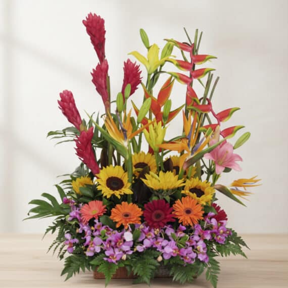 Arreglo Floral GINGER: Diseño Exótico con Orquídea Hawaiana para tu Hogar Arreglo floral GINGER exótico con orquídea hawaiana, heliconias, jengibre rojo, girasoles y gerberas en tonos vibrantes sobre